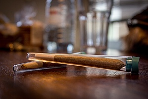 two cigar tubes being used to keep freshly rolled joints new and fresh