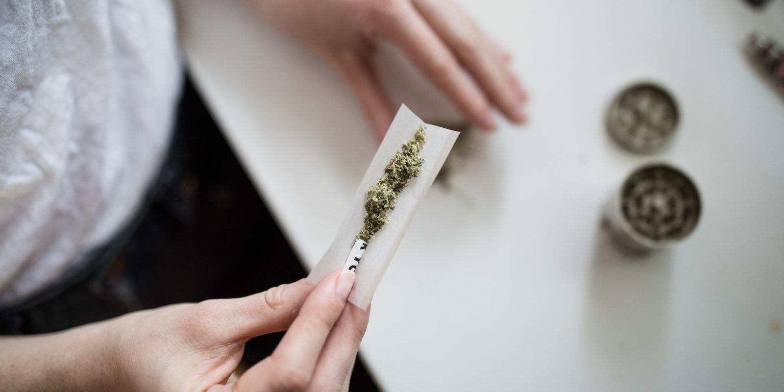 paper is filled with grinded cannabis before being rolled into pre-rolled blunts
