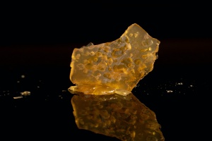 cannabis resin on a black background