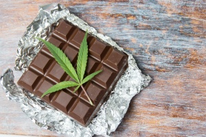 cannabis edibles of chocolate bar with leaf on it