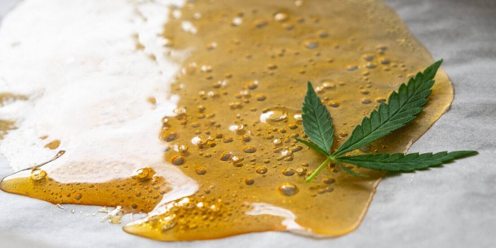 strong extract of gold cannabis wax with high thc close up