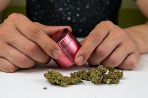 women using a Weed Grinder